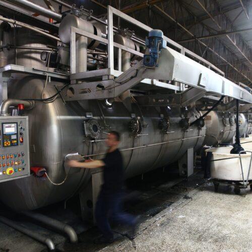 Wet processing fabric dye production in a factory.