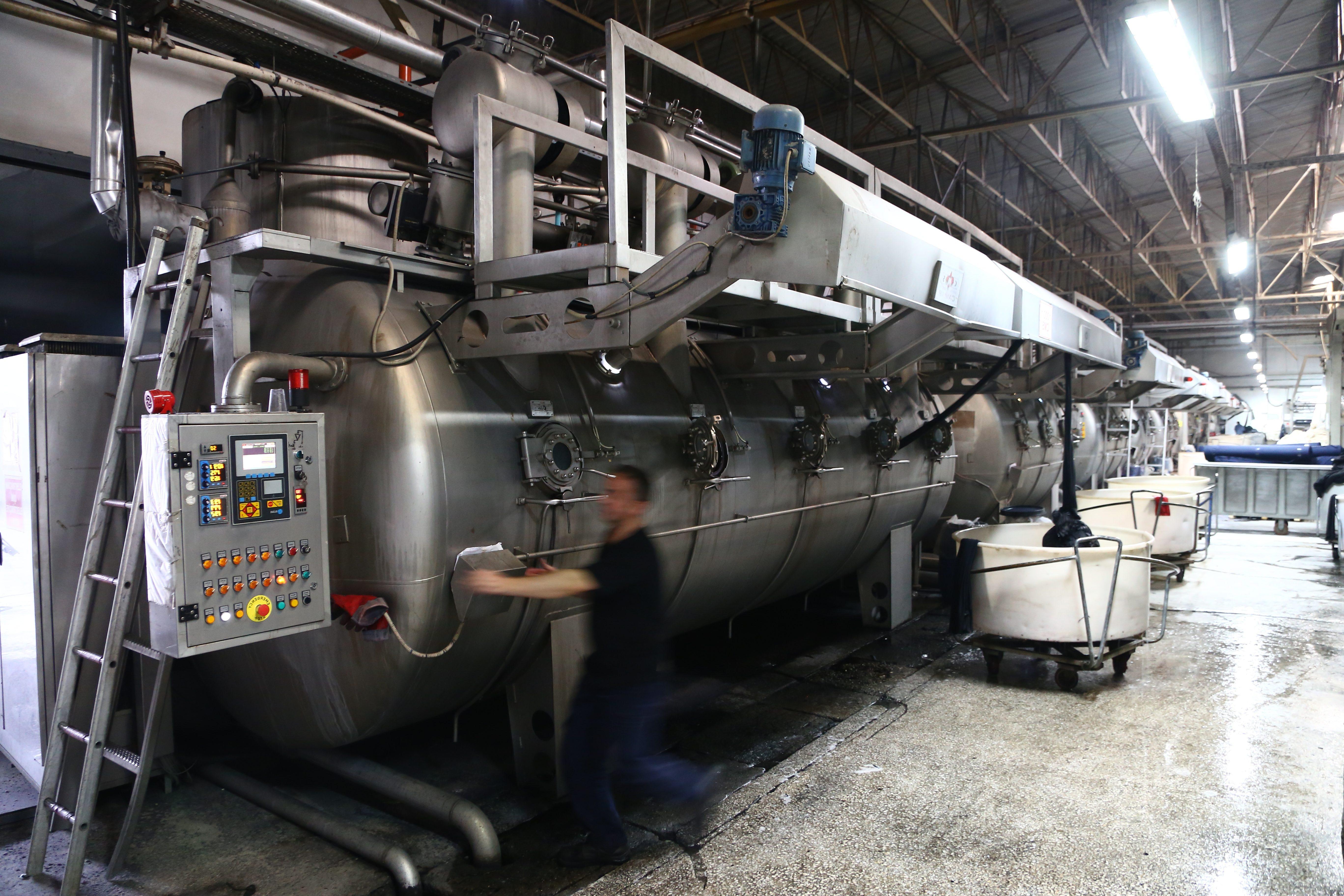 Wet processing fabric dye production in a factory.