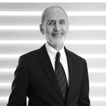 Portrait of Harish Ahuja, CEO of Shahi Exports, in black and white.